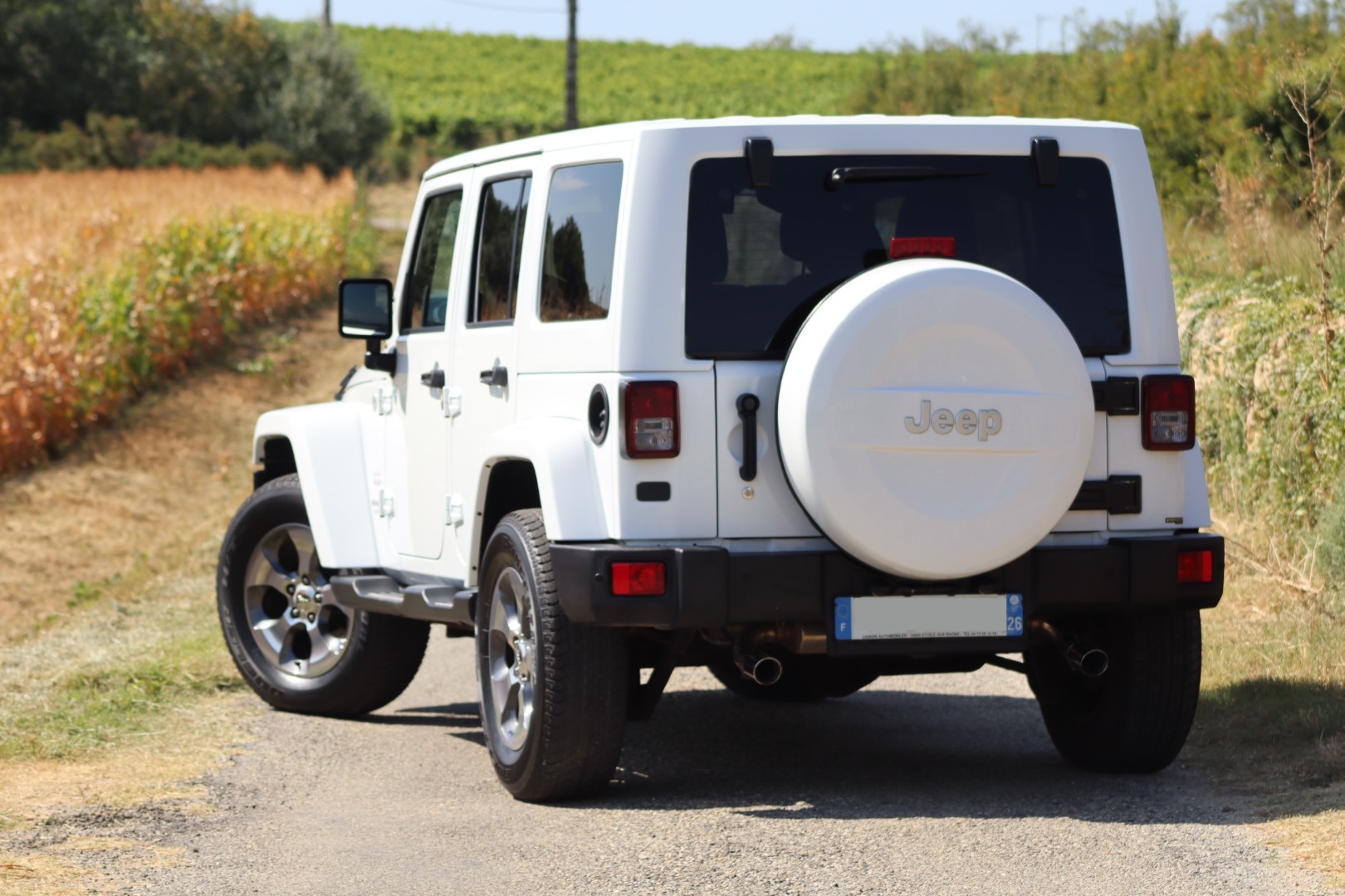 Photo Jeep Wrangler Unlimited Sahara 3.6 v6 284 ch avec la bache pour l'été