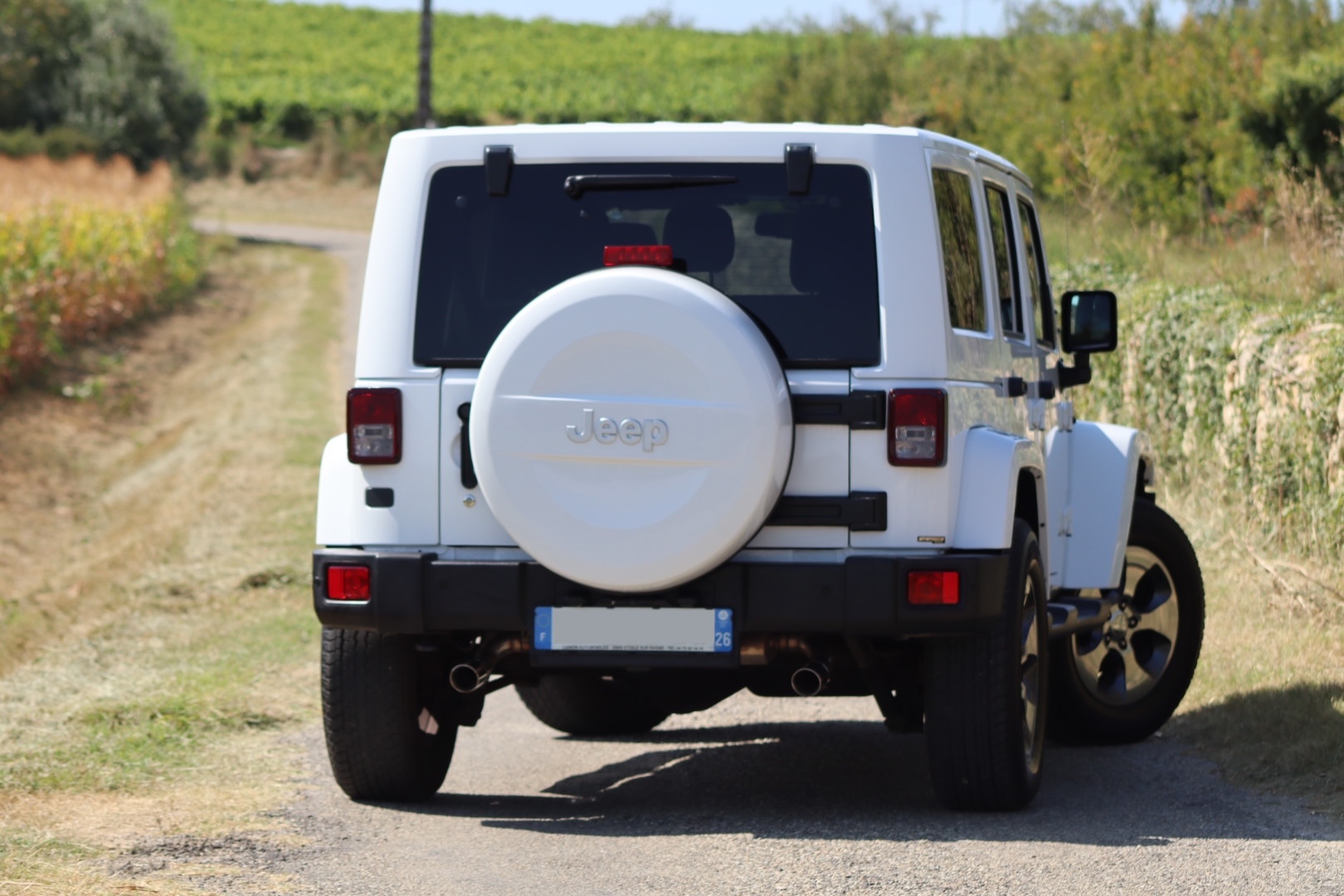 Photo Jeep Wrangler Unlimited Sahara 3.6 v6 284 ch avec la bache pour l'été