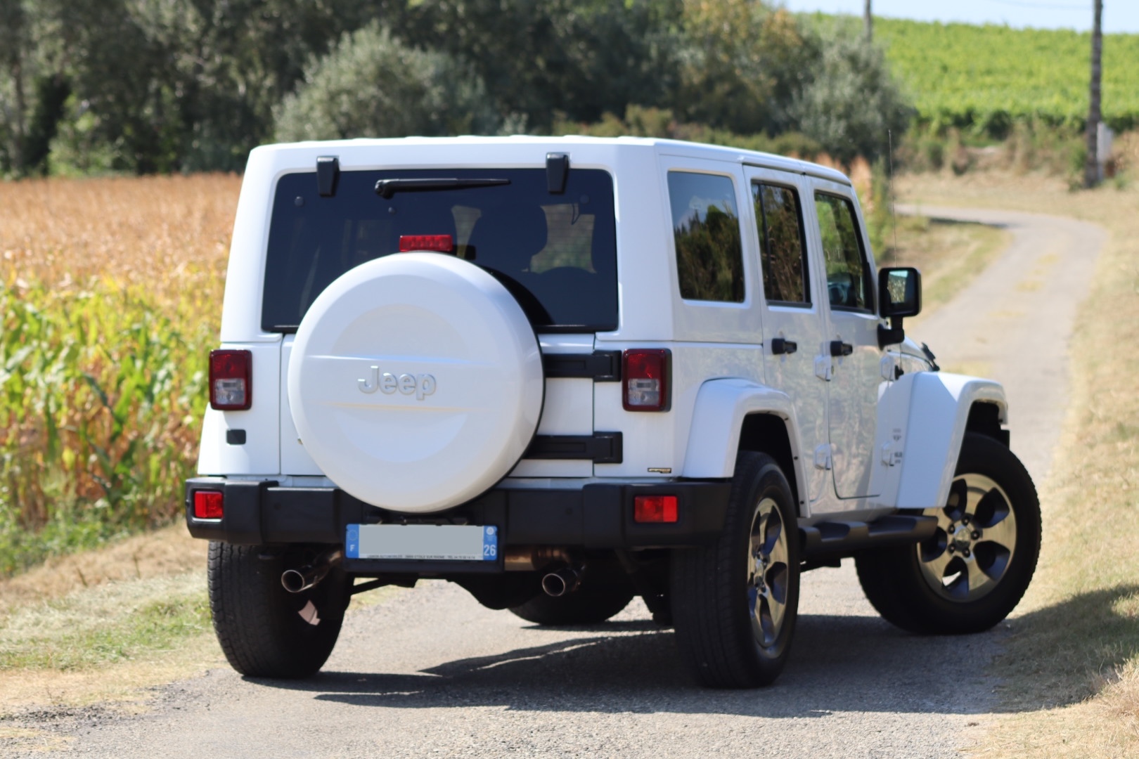 Photo Jeep Wrangler Unlimited Sahara 3.6 v6 284 ch avec la bache pour l'été