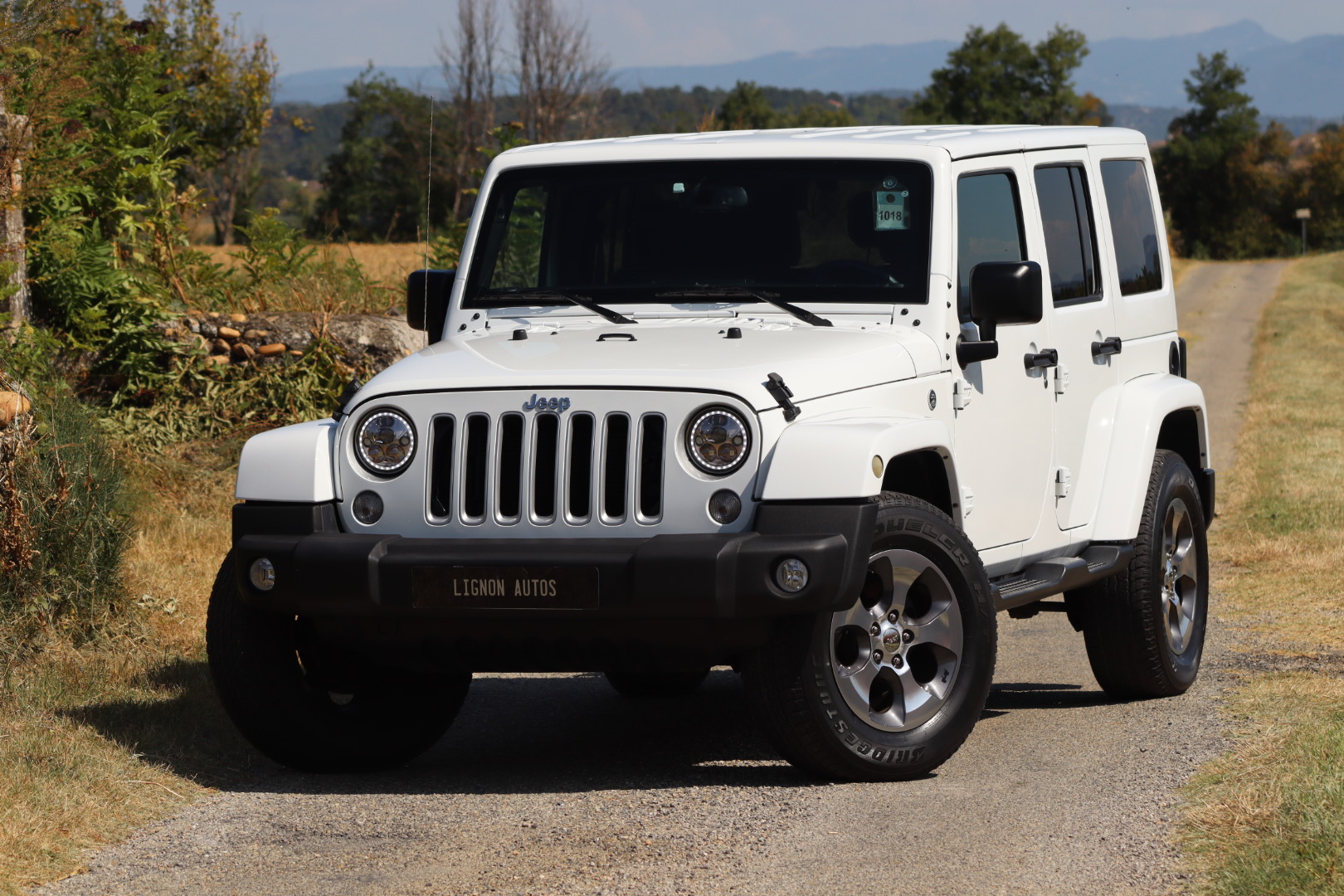 Photo Jeep Wrangler Unlimited Sahara 3.6 v6 284 ch avec la bache pour l'été