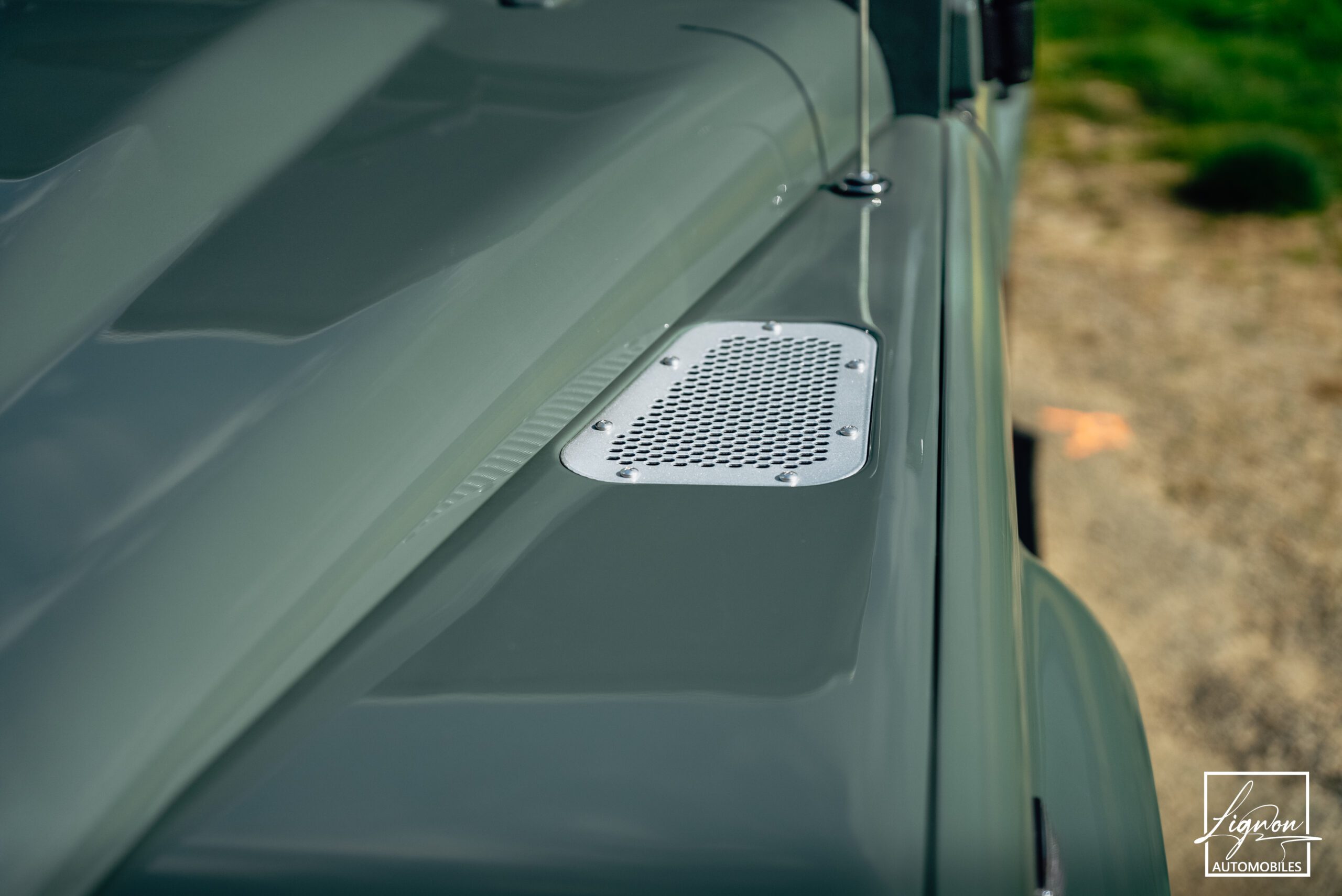 Photo Land Rover Defender 90 td4 sw 4 places "Keswick Green"