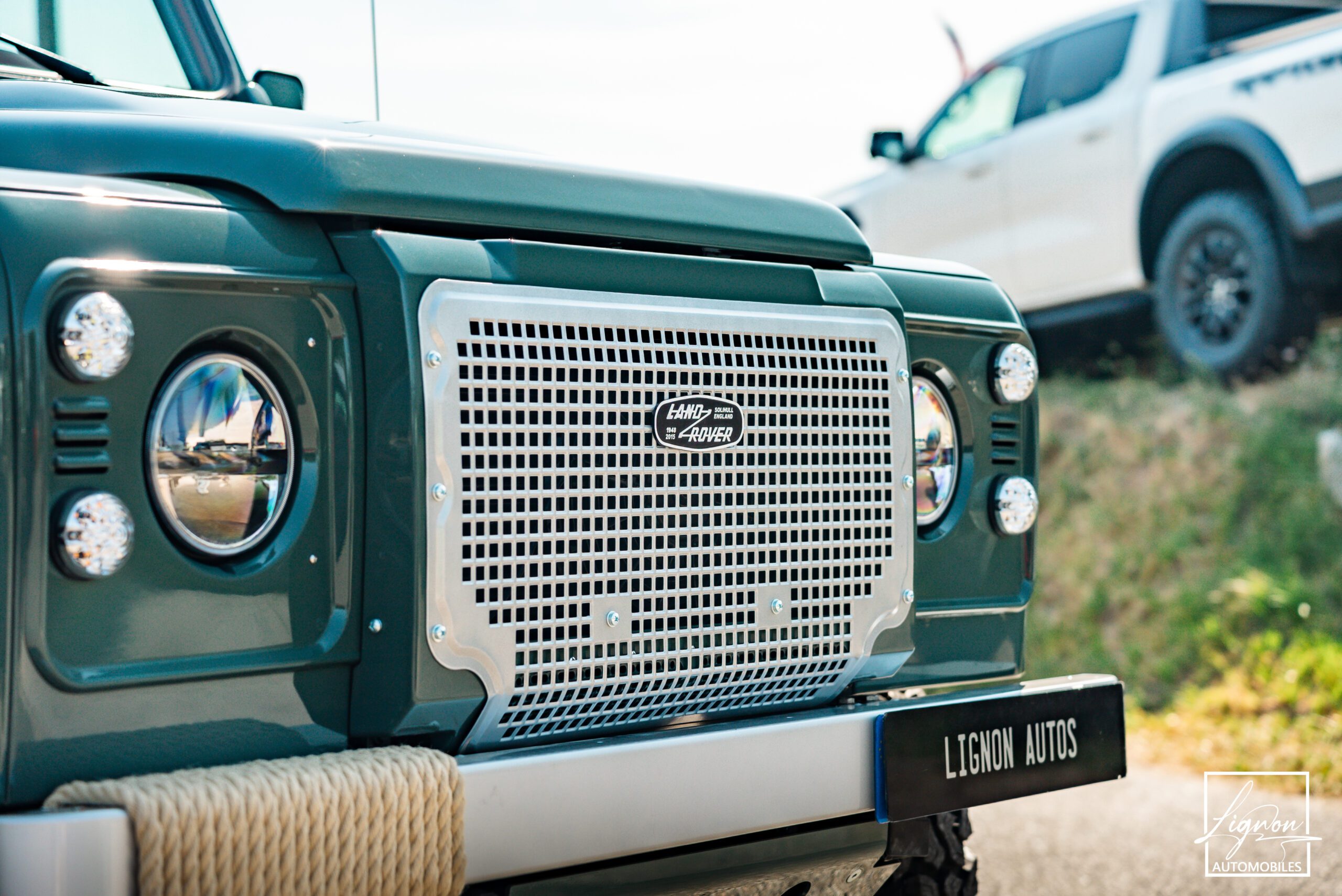 Photo Land Rover Defender 90 td4 2.2 Soft Top "Keswick Green"