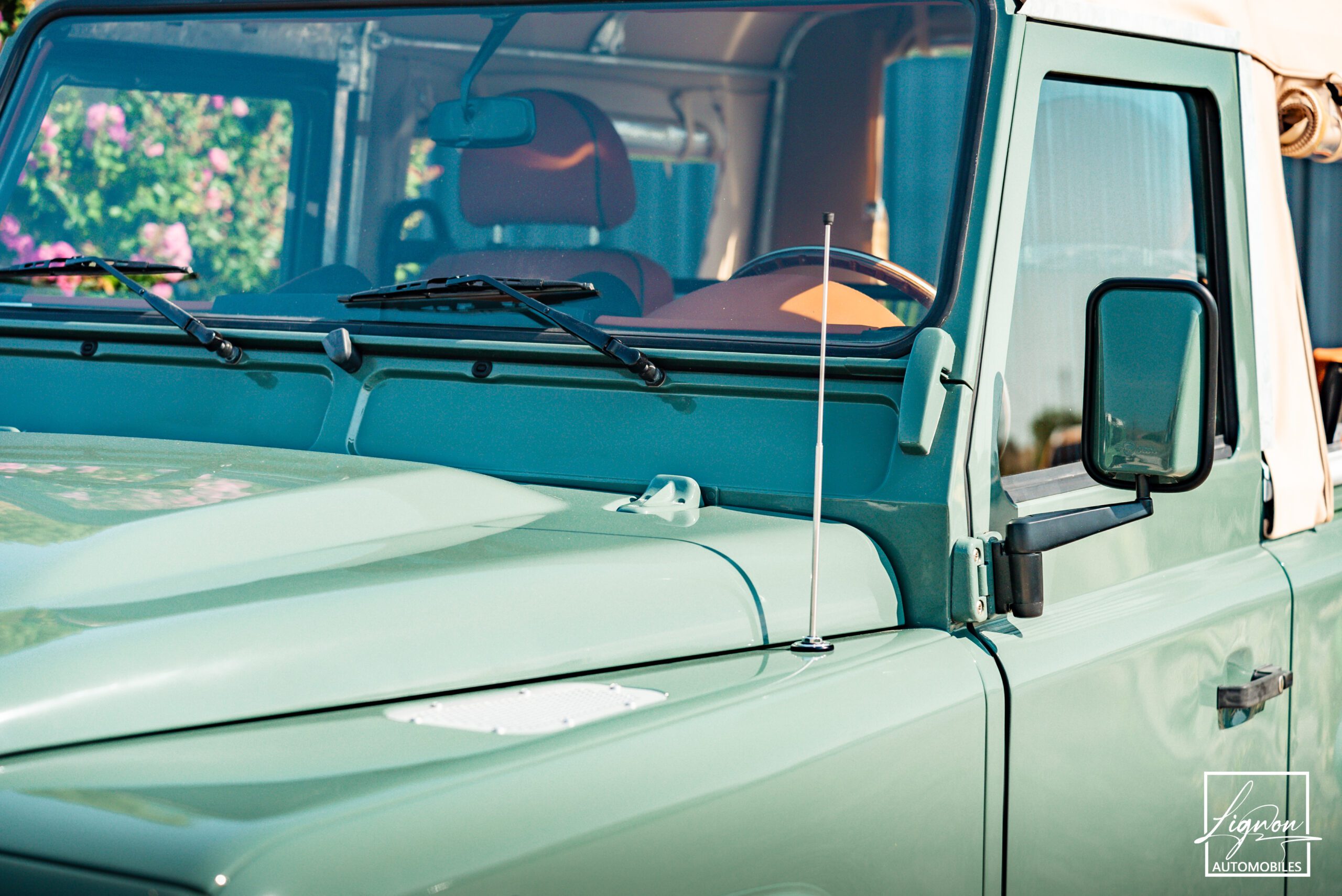 Photo Land Rover Defender 90 td4 2.2 Soft Top "Keswick Green"
