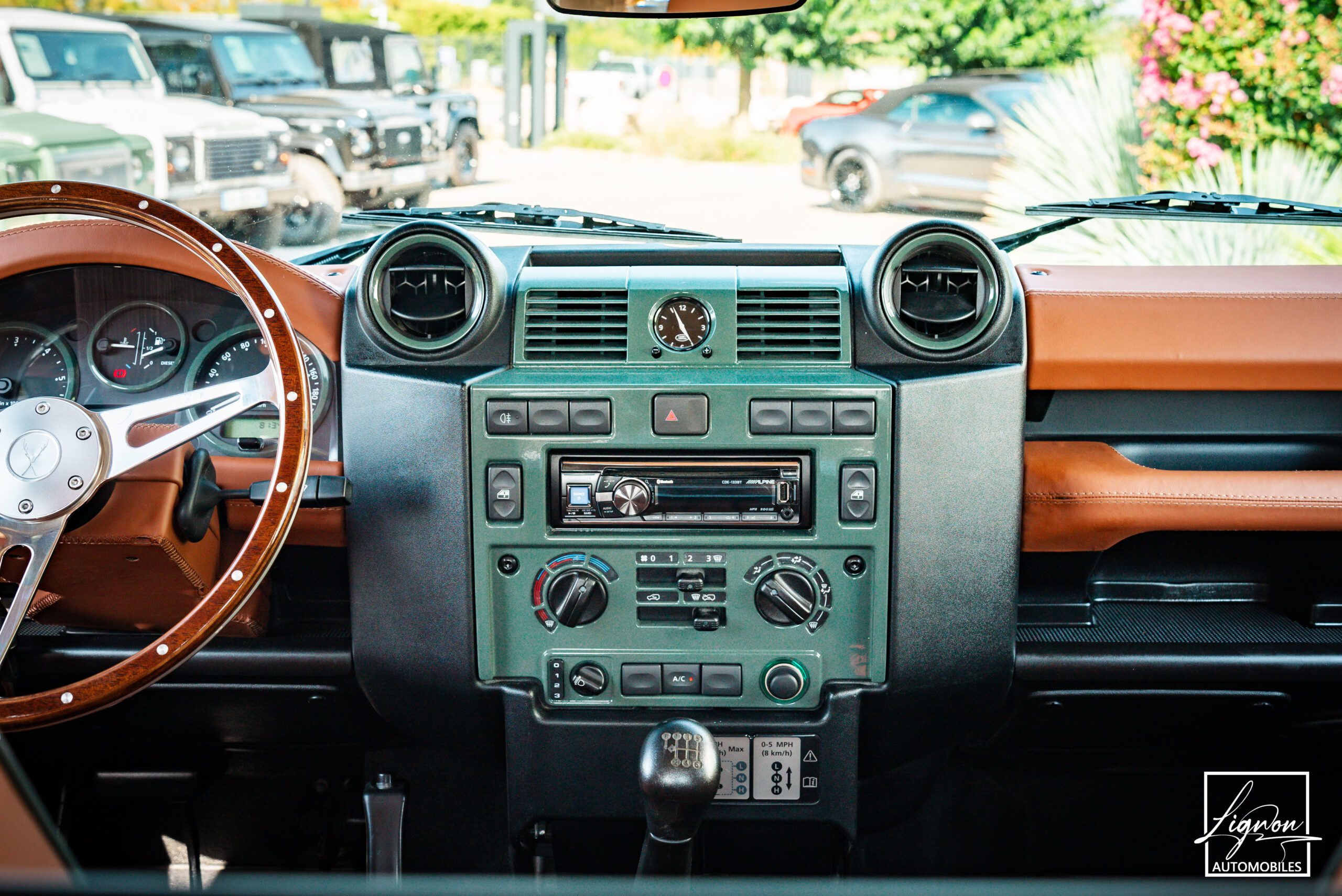 Photo Land Rover Defender 90 td4 2.2 Soft Top "Keswick Green"