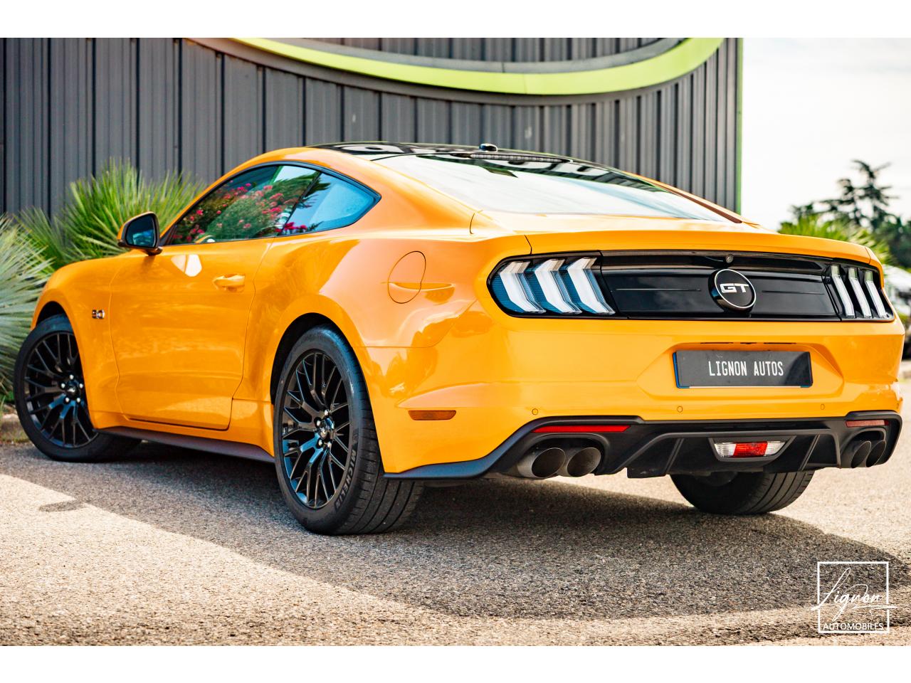 Photo FORD MUSTANG GT Fastback 5.0L V8 450 CH BVM6 Orange Fury Récaro - à partir de 734 euros