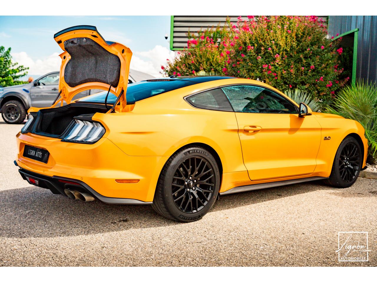 Photo FORD MUSTANG GT Fastback 5.0L V8 450 CH BVM6 Orange Fury Récaro - à partir de 734 euros