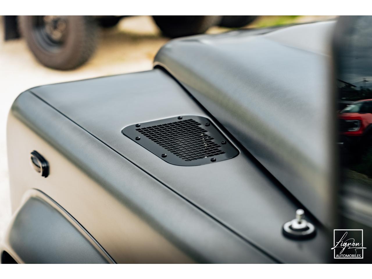 Photo LAND ROVER DEFENDER 110 2,2L Td4 Soft Top Frozen Grey