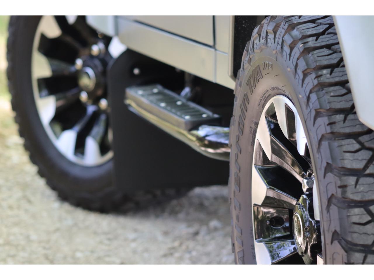 Photo LAND ROVER DEFENDER 90 TD4 2.4L Soft top  Pangea Mat