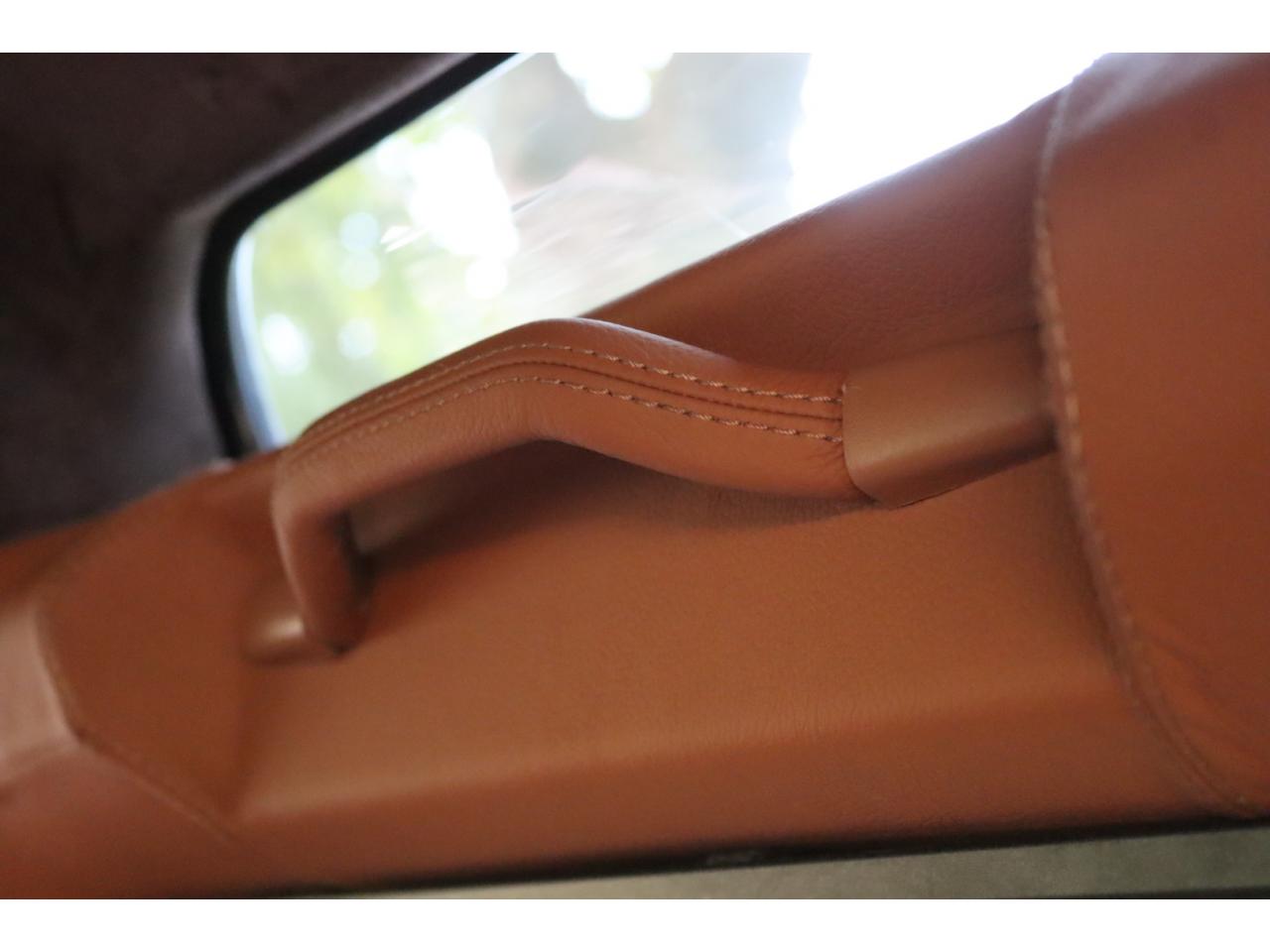 Photo LAND ROVER DEFENDER 90 TD4 2,2L Station Wagon 4 places  - Hunter Green - TVA Apparente